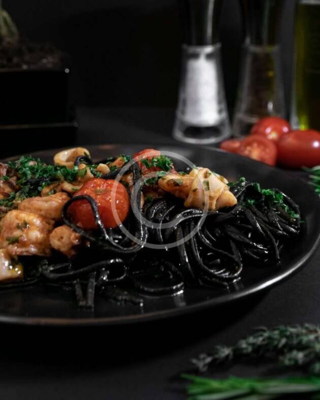 Squid ink pasta with seafood